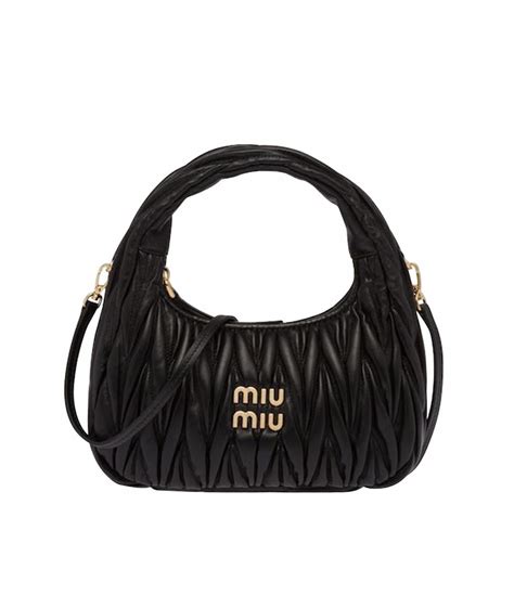 Сумки и обувь Miu Miu .